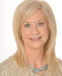 Smiling blonde woman professional headshot portrait